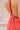 Robe Prestance corail By Louise zoom nœud