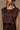 Chocolate-colored off-the-shoulder top By Louise